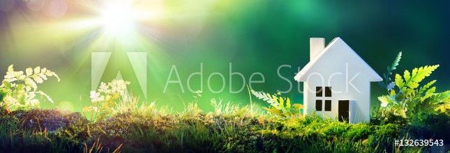 Bild på Eco Friendly House - Paper Home On Moss In Garden